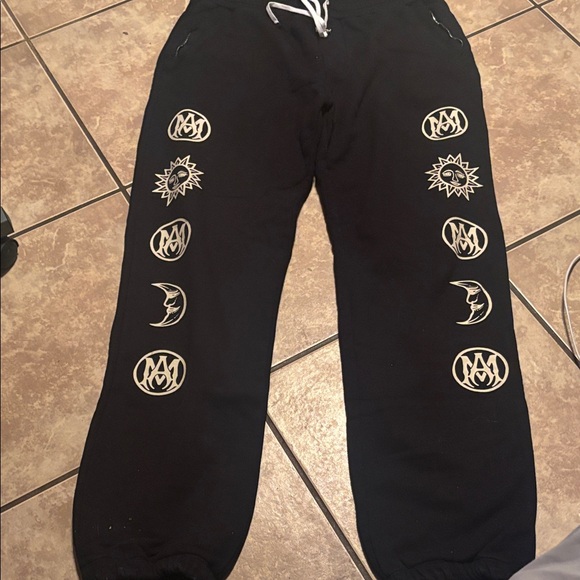 AMIRI Black Joggers with Cream Graphic - Picture 1 of 5